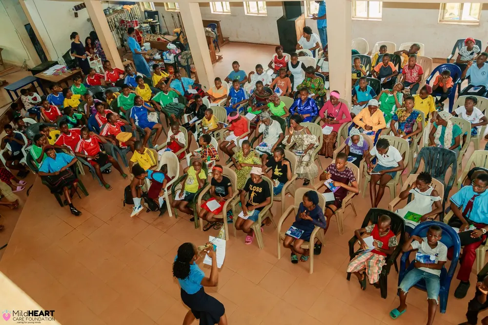 Mildheart outreach with a hall full of young people